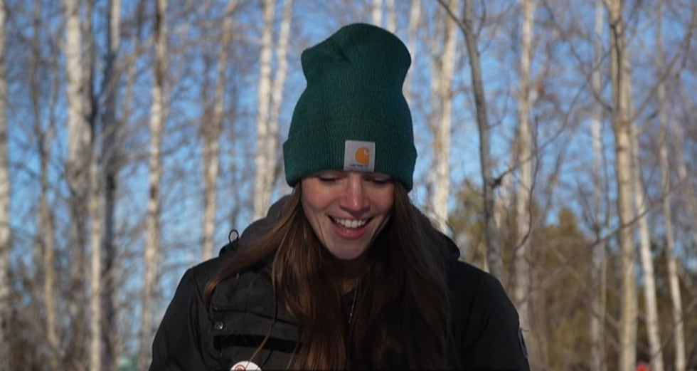Brea Schminski snowshoes with her kids on their Hermantown-area property.