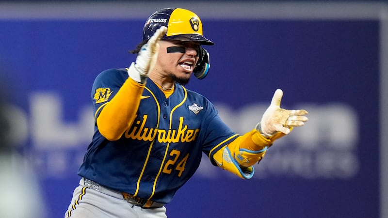 Milwaukee Brewers catcher William Contreras celebrates his RBI double during the sixth inning...