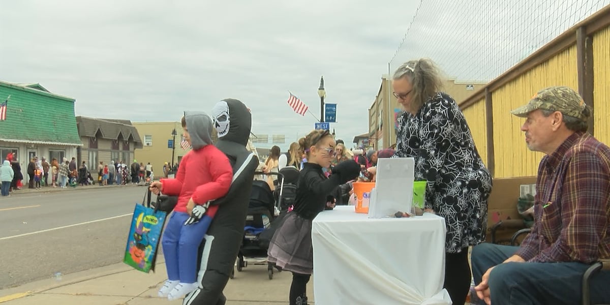 Trick-or-treaters celebrate Halloween early in downtown Carlton
